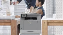 office space with Sharp printer in the foreground