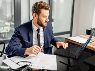 man working at computer