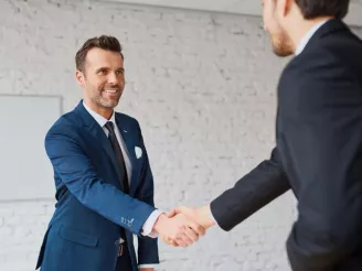 two men shaking hands