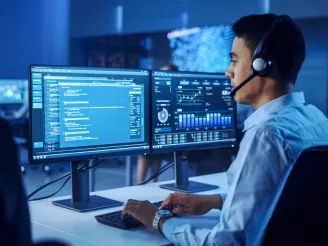 man at desk in call centre