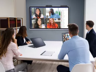 A team meeting using a Windows Collaboration Display