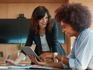 Business women using tablet