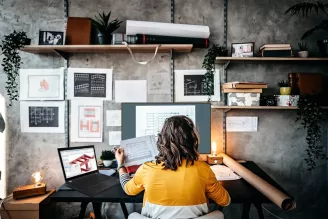 a-woman-working-on-a-desk