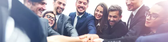 A group taking part in a group handshake