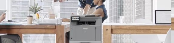 office space with Sharp printer in the foreground